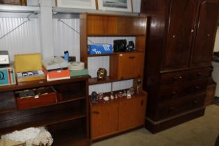 A 1970s teak effect wall unit