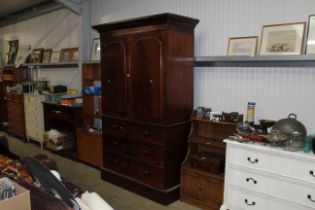 A Victorian mahogany linen press with two short an