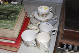 Various commemorative mugs and tea ware