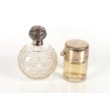 A late Victorian cut glass and silver mounted scent bottle, Birmingham 1898; and a cylindrical glass