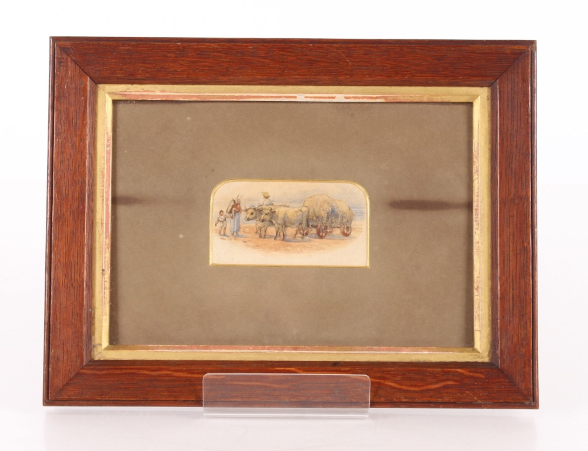 A small Victorian watercolour depicting three figures tending to ox whilst pulling a haycart; and - Image 2 of 6