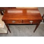 A mahogany single dropleaf side table fitted with two frieze drawers raised on square tapering