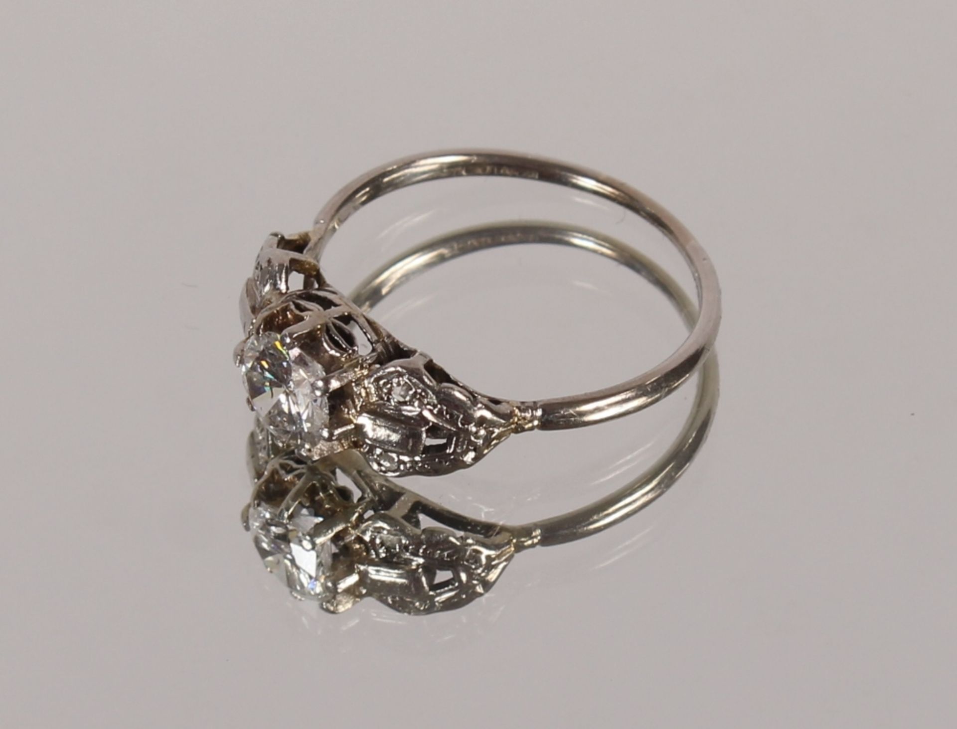 An Art Deco design cluster ring, having large central brilliant cut diamond, approx. ½carat, 3.9gms - Image 3 of 3