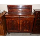 A Victorian mahogany chiffonier, having raised back above two frieze drawers, cupboards below