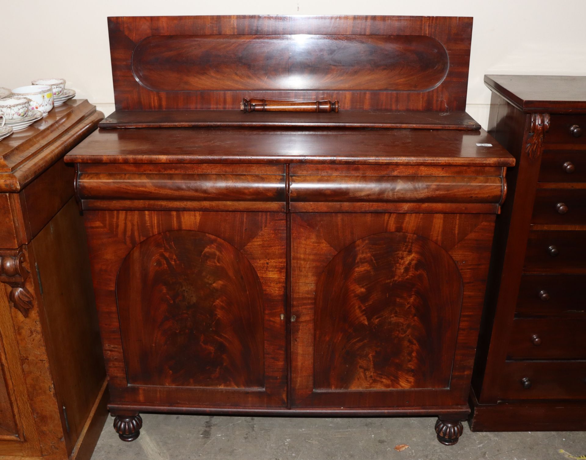 A Victorian mahogany chiffonier, having raised back above two frieze drawers, cupboards below