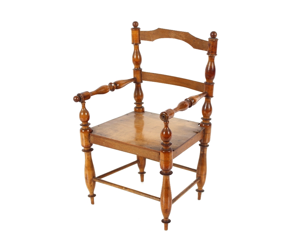 A Victorian walnut child's chair