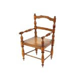 A Victorian walnut child's chair