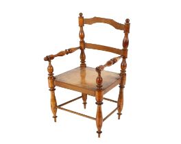 A Victorian walnut child's chair