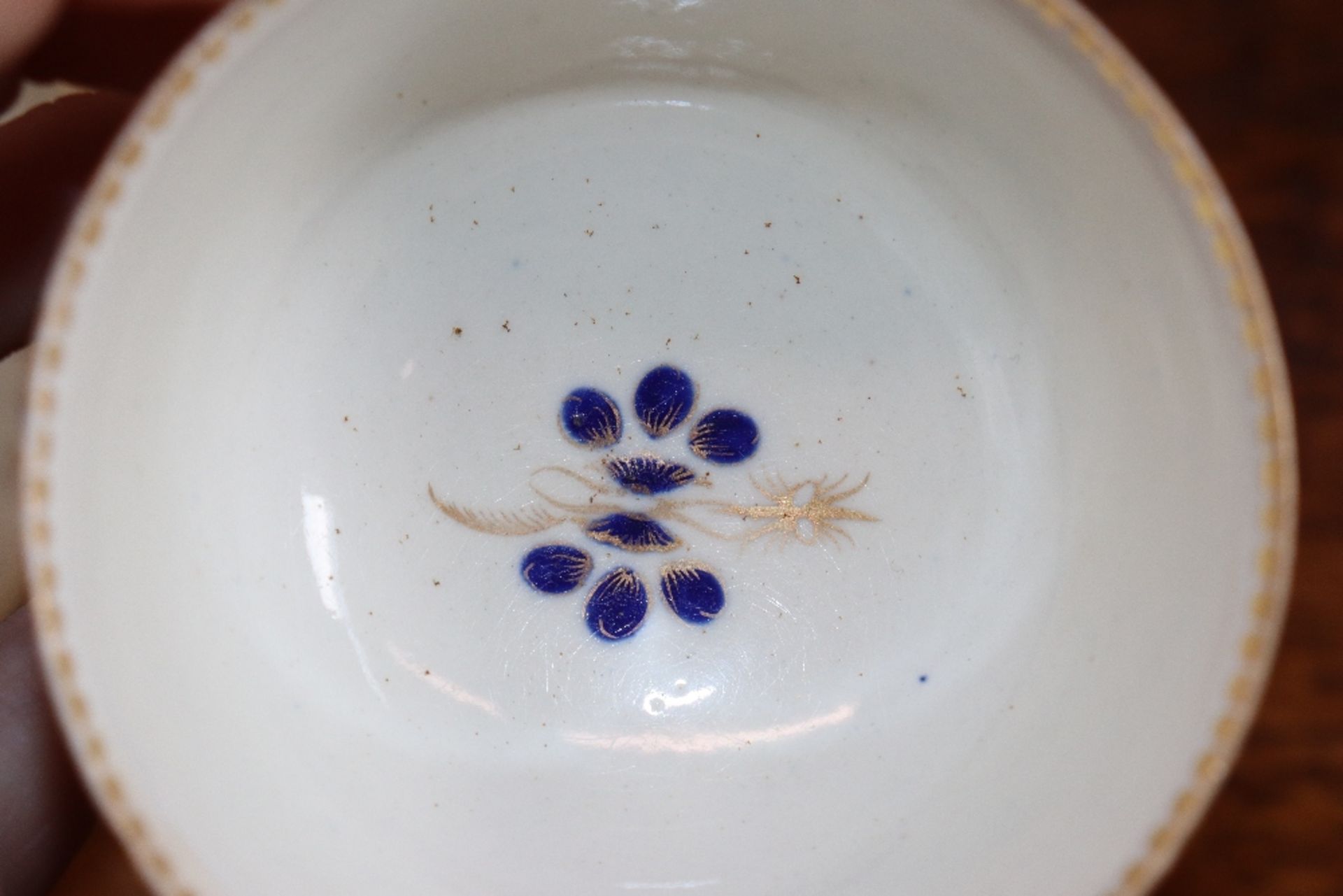 A 19th Century English porcelain part tea set having blue floral decoration heightened in gilt, - Image 20 of 33