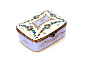 A small Limoges hinged box and cover, having floral spray decoration to the lid, no sides,