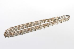 A silver and gilt triple strand designed necklace, Hallmarked, 40gms