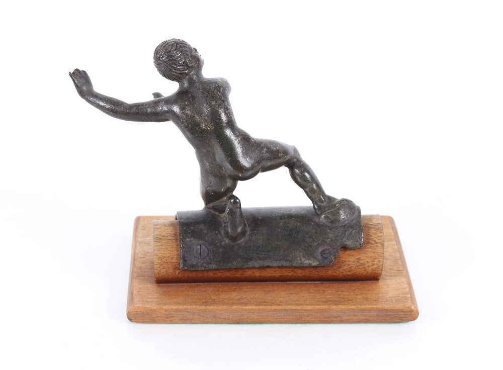 A bronze figure of a naked man balanced on a log, set on a wooden base, 17cm high - Image 2 of 2