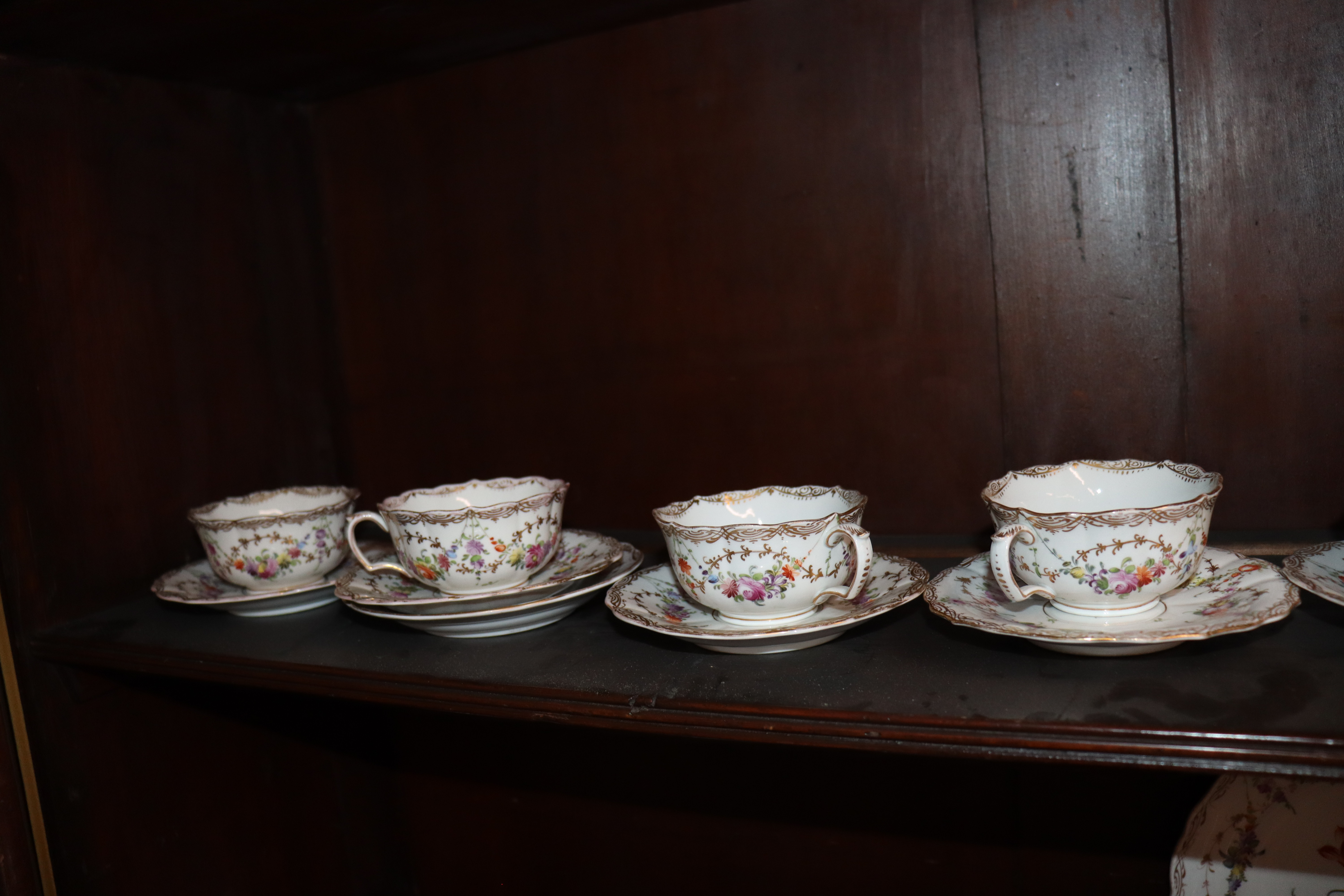 A Meissen part tea set, having painted foliate sprays heightened in gilt within shaped borders, - Bild 9 aus 9