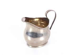 A late Victorian silver baluster cream jug, Birmingham 1897, makers mark J.M.B., 9cm high