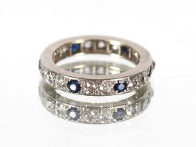 A platinum, sapphire and diamond full eternity ring, 4.6gms, Size L