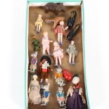 A collection of miniature porcelain and other dolls; miniature mice etc.