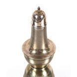 A silver baluster sugar shaker with engine turned decoration, Birmingham 1934, 16cm high