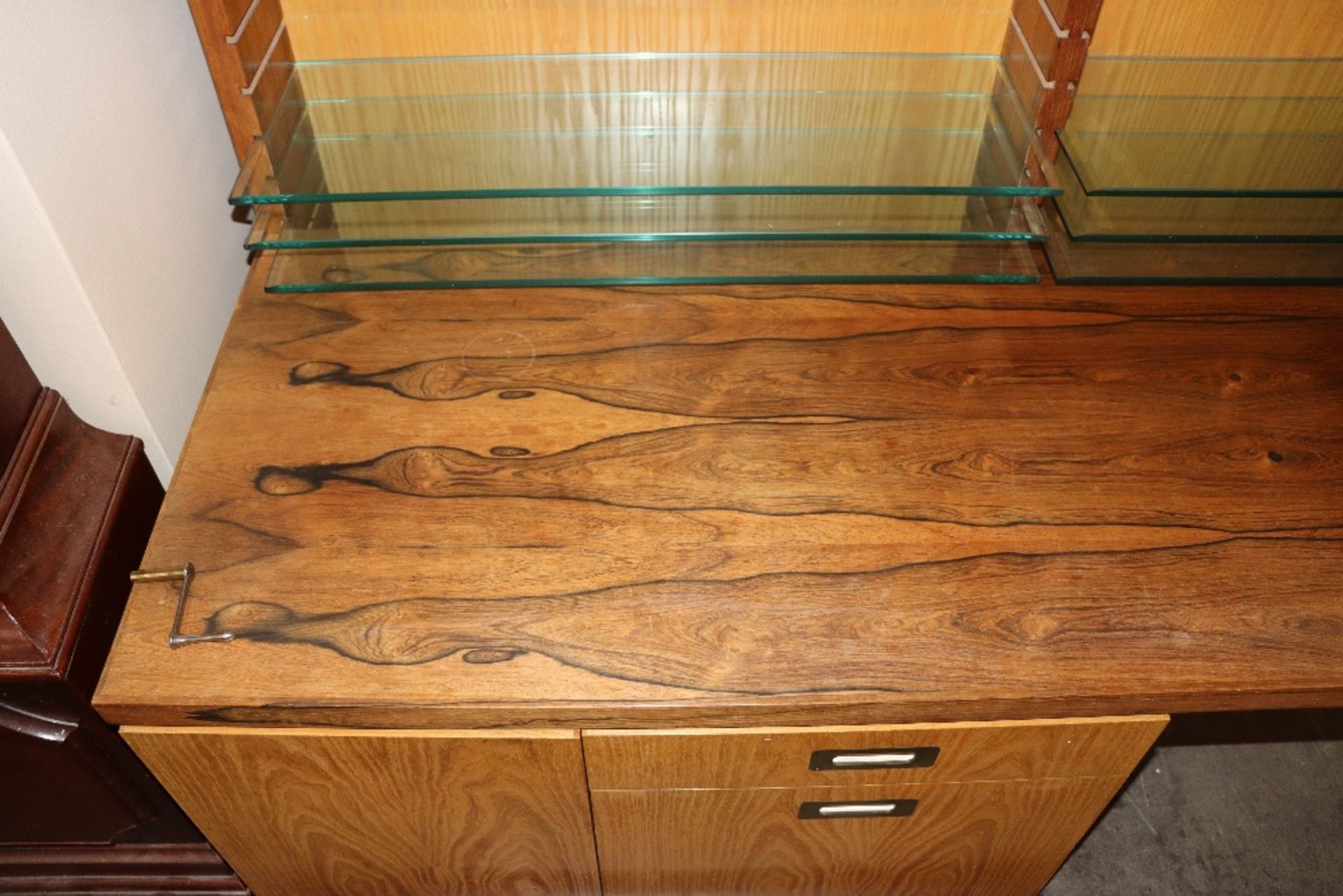 Desmond Ryan, a 1970's rosewood side cabinet fitted adjustable glass shelves and cupboards below, - Image 19 of 26