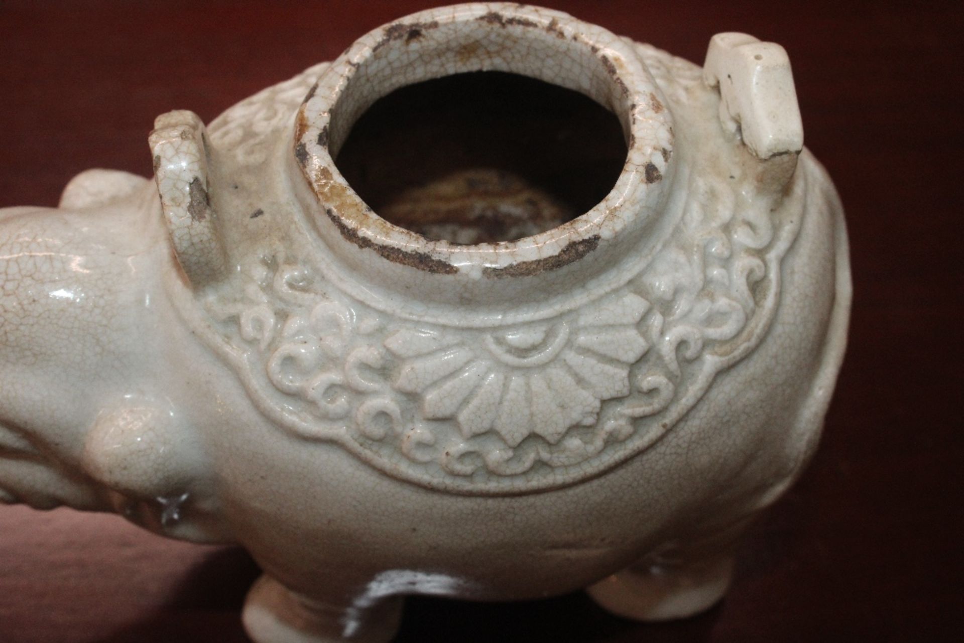 A Chinese blanc de chine water dropper in the form of an elephant, having moulded decoration to - Image 8 of 21