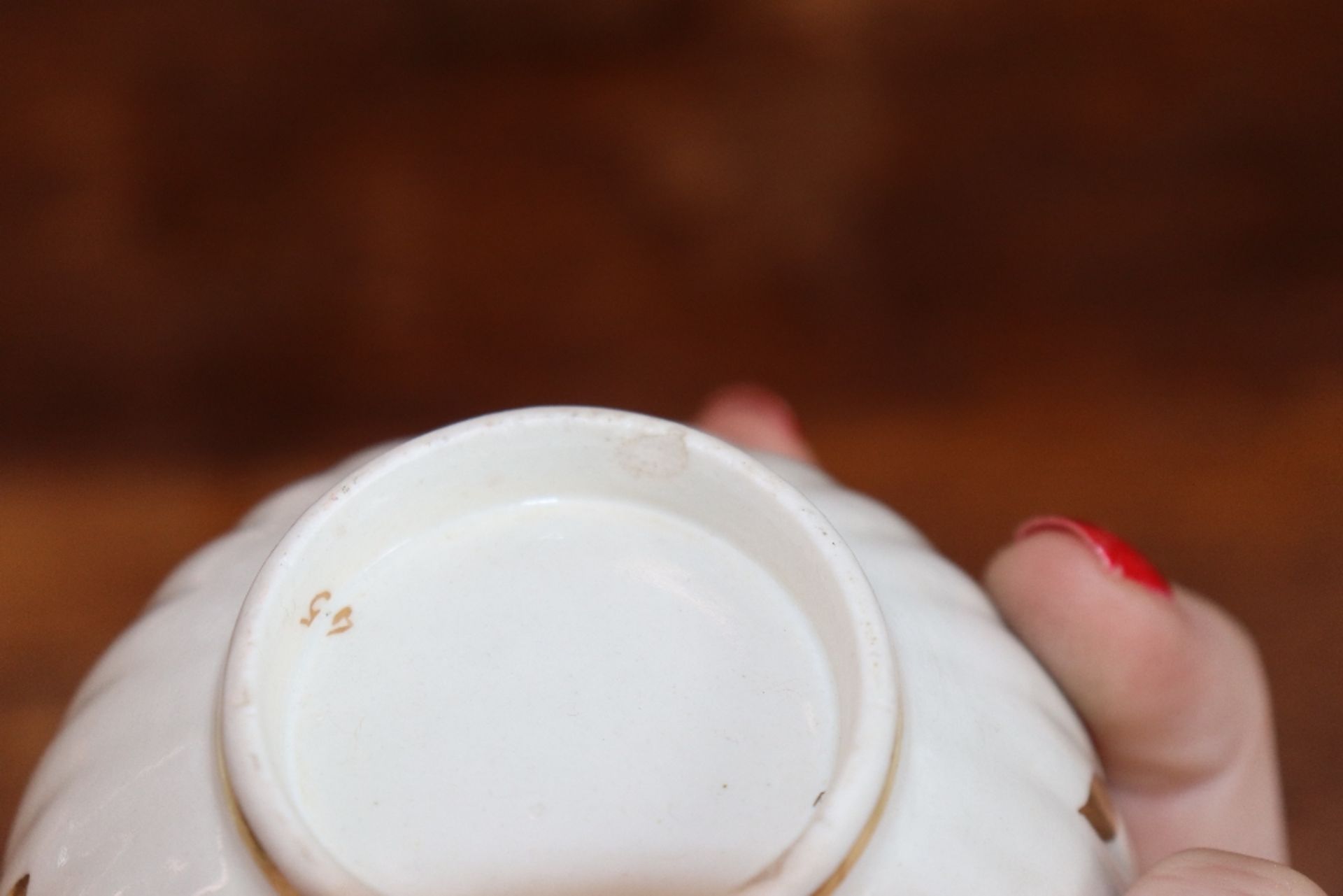 An early 19th Century English porcelain part tea set, of fluted design comprising numerous cups, - Image 12 of 32