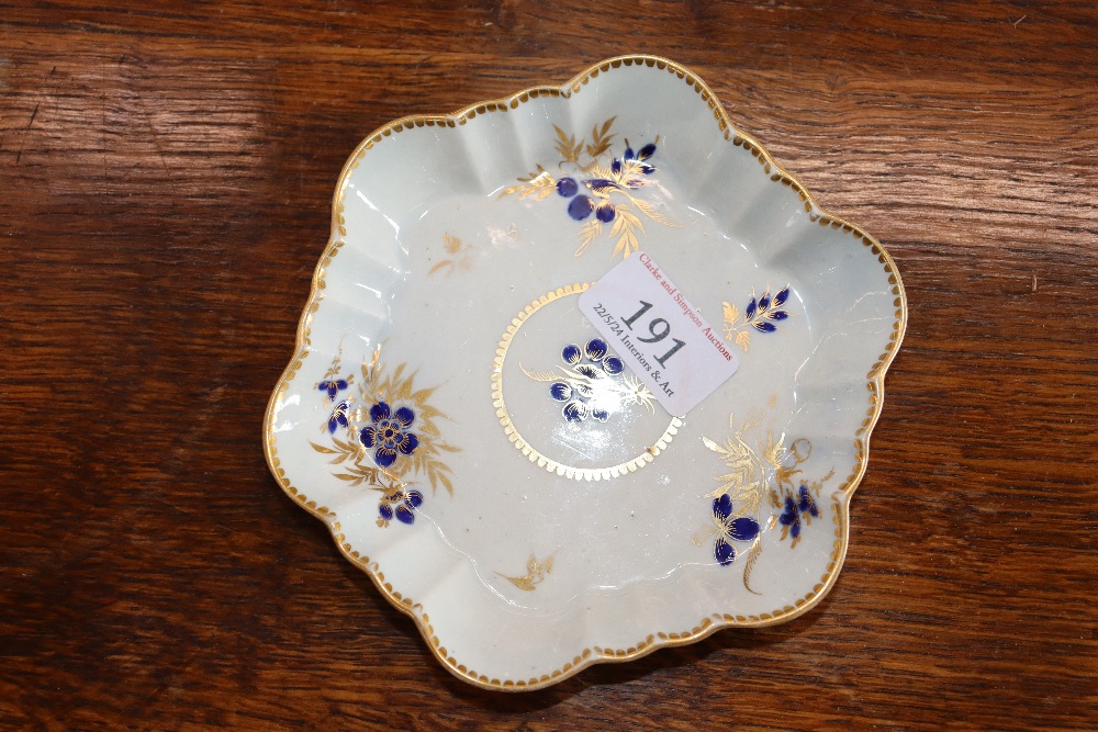 A 19th Century English porcelain part tea set having blue floral decoration heightened in gilt, - Image 31 of 33