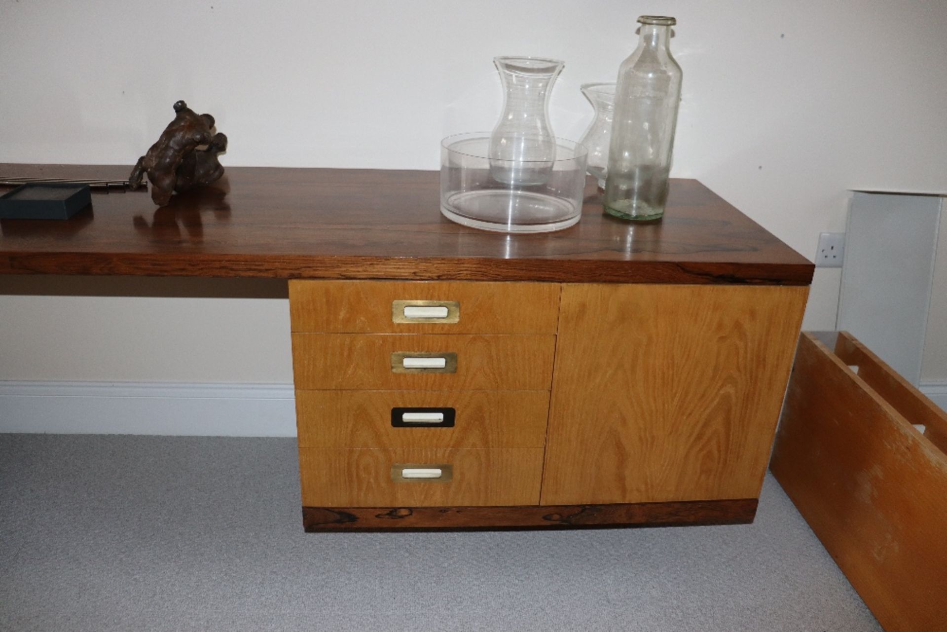 Desmond Ryan, a 1970's rosewood side cabinet fitted adjustable glass shelves and cupboards below, - Image 9 of 26