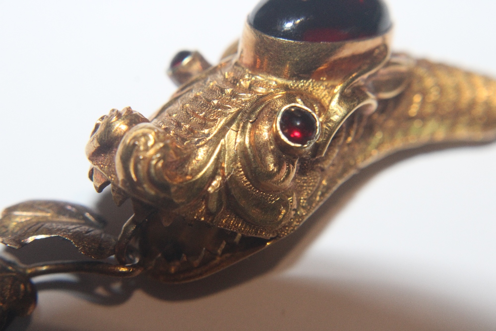 A Victorian yellow metal and garnet set serpent necklace, 18gms total weight, (tests as gold) in - Image 25 of 34