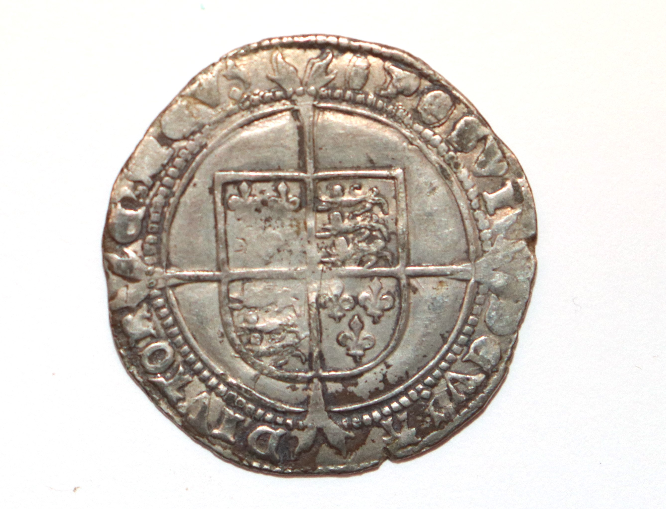 An Edward VI sixpence, MM tun facing bust with rose