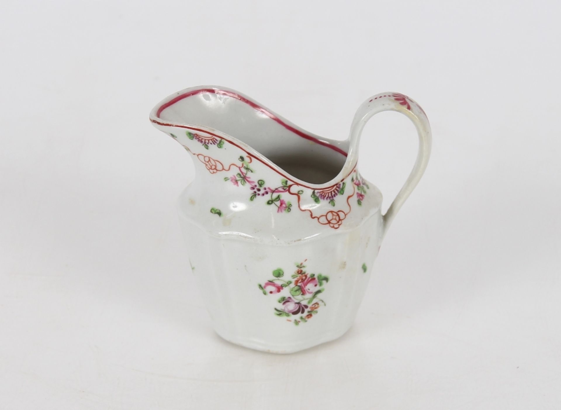 A Newhall porcelain cream jug, of fluted form, floral spray decoration marked N173 to base; and a - Image 4 of 6