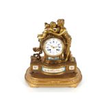 A French ormolu mantel clock by Julian Leroy, Paris surmounted by figures of a maiden and cherub