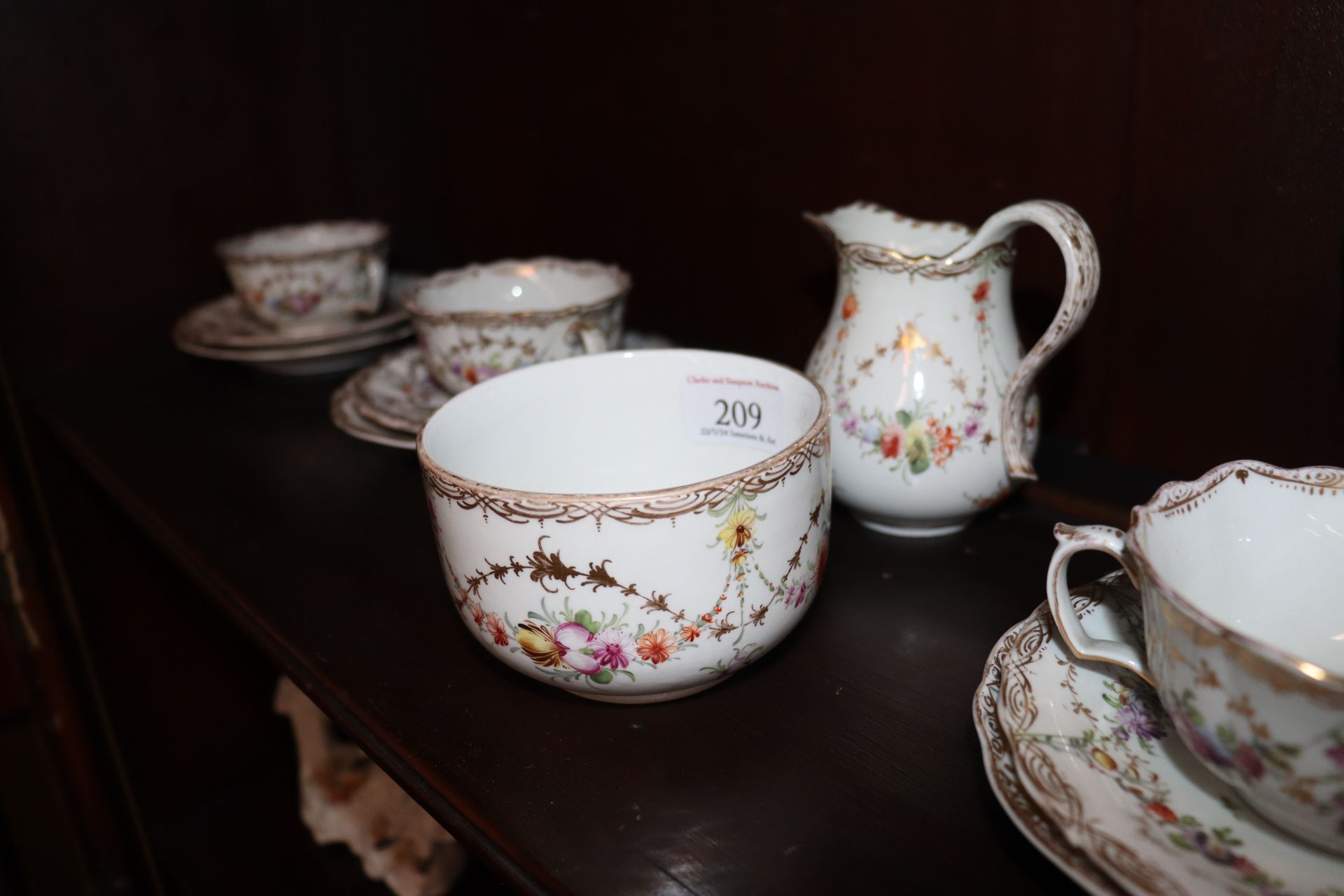 A Meissen part tea set, having painted foliate sprays heightened in gilt within shaped borders, - Image 7 of 9