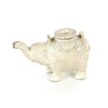 A Chinese blanc de chine water dropper in the form of an elephant, having moulded decoration to