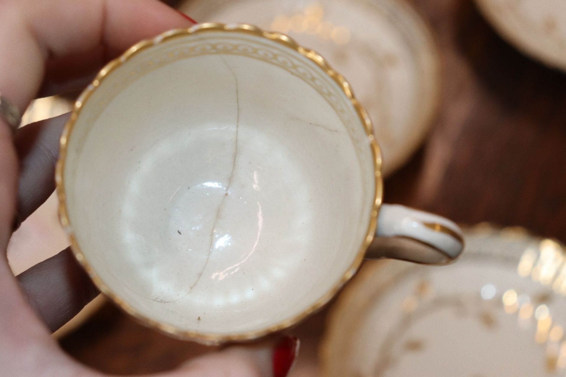 An early 19th Century English porcelain part tea set, of fluted design comprising numerous cups, - Image 23 of 32