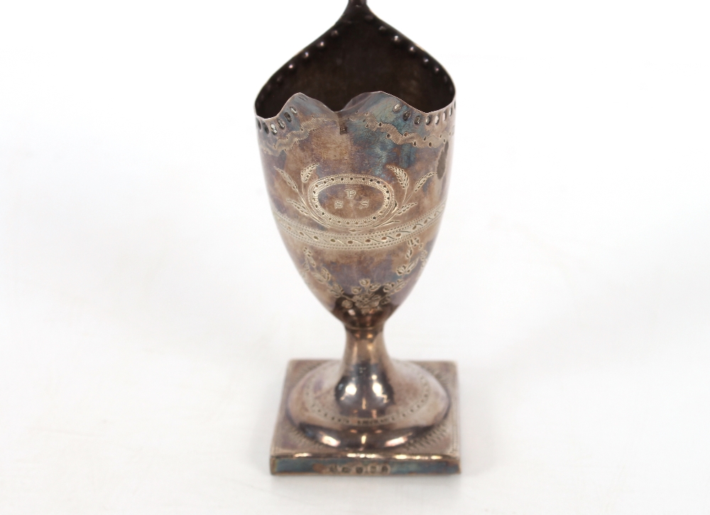 A George III silver pedestal cream jug, having foliate scroll decoration the central cartouche - Image 2 of 3