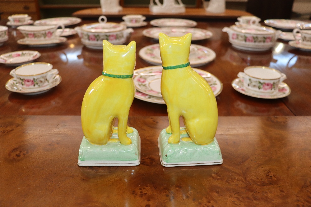 A pair of Staffordshire yellow glazed figures of seated cats on cushions, 20cm high - Image 2 of 18