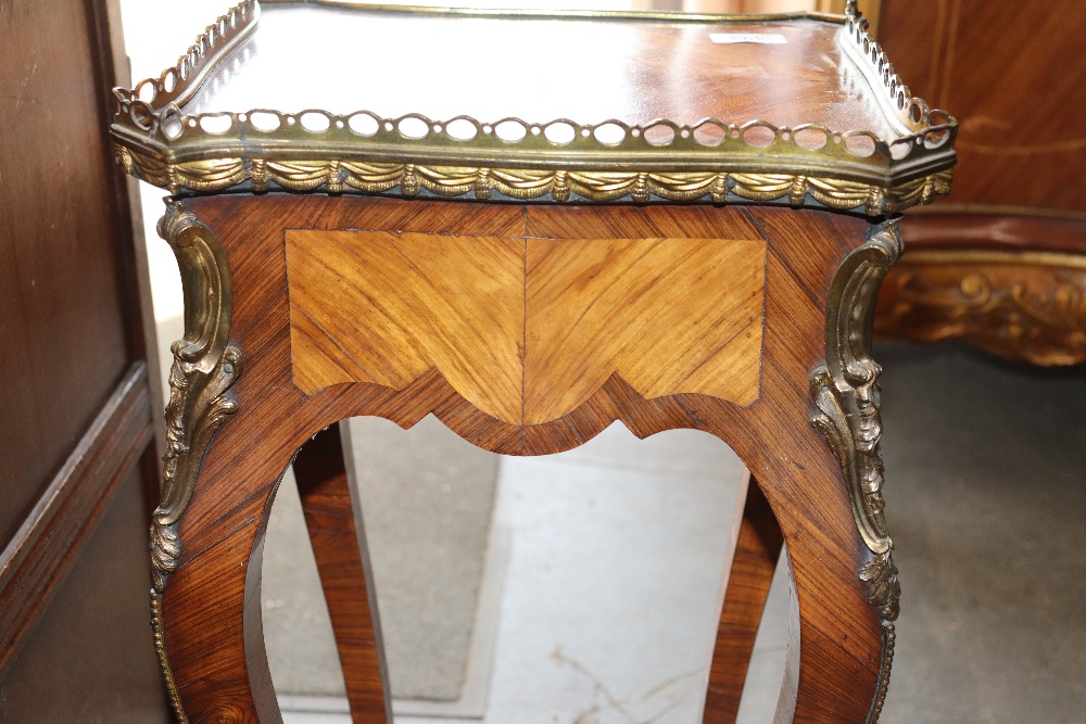 A pair of 19th Century French walnut and cross banded two tier side tables surmounted by pierced - Image 9 of 110