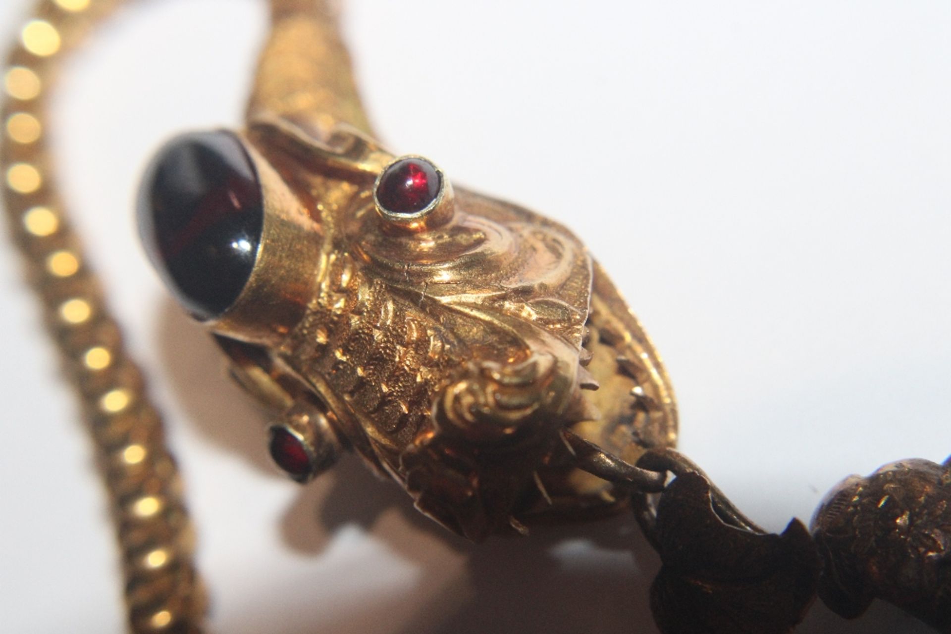 A Victorian yellow metal and garnet set serpent necklace, 18gms total weight, (tests as gold) in - Image 34 of 34