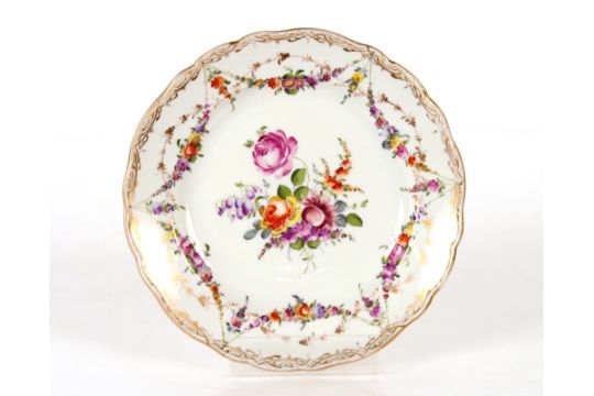 A Meissen part tea set, having painted foliate sprays heightened in gilt within shaped borders, - Image 1 of 9