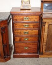 A mahogany chest of narrow proportions fitted five graduated drawers, with sunken brass military