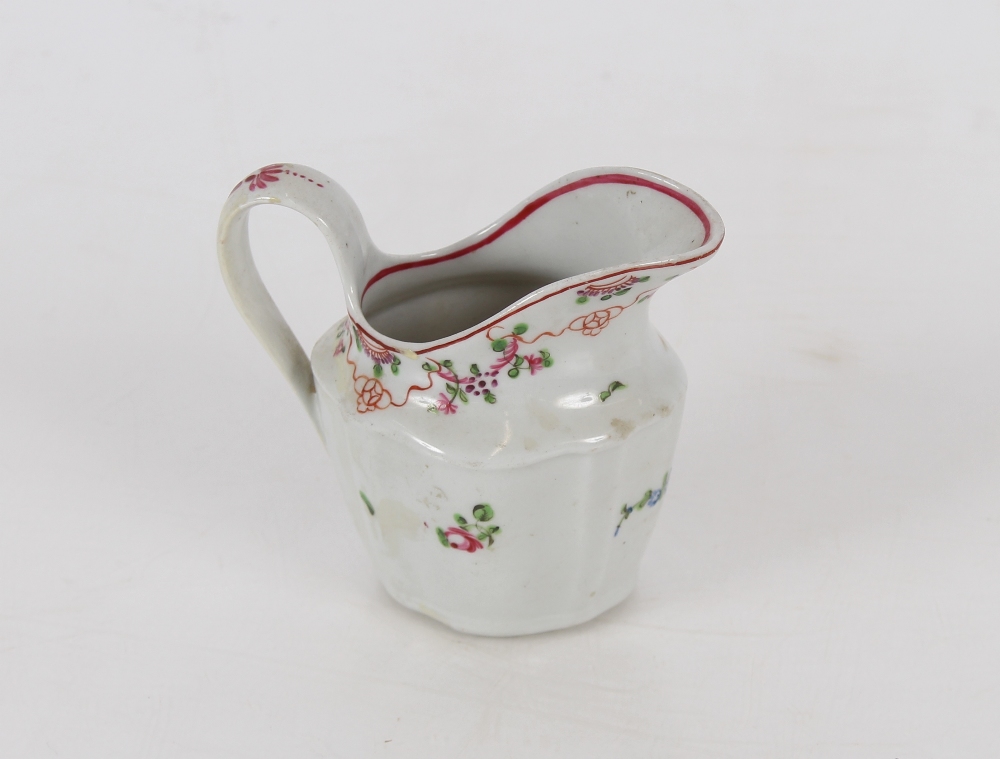 A Newhall porcelain cream jug, of fluted form, floral spray decoration marked N173 to base; and a - Image 5 of 6