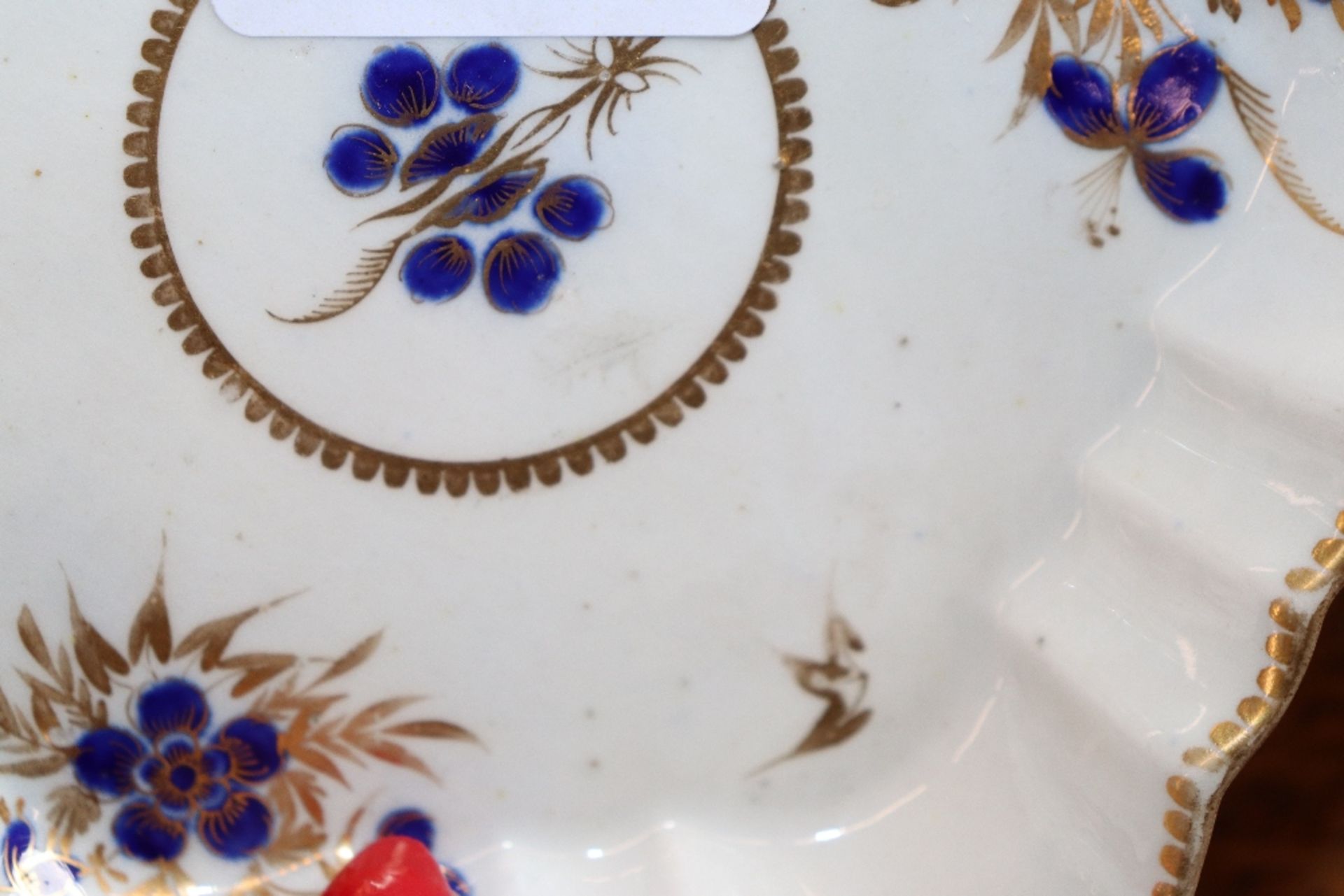 A 19th Century English porcelain part tea set having blue floral decoration heightened in gilt, - Image 32 of 33