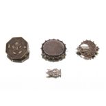 Four various silver and white metal brooches, decorated flowers, butterflies etc.