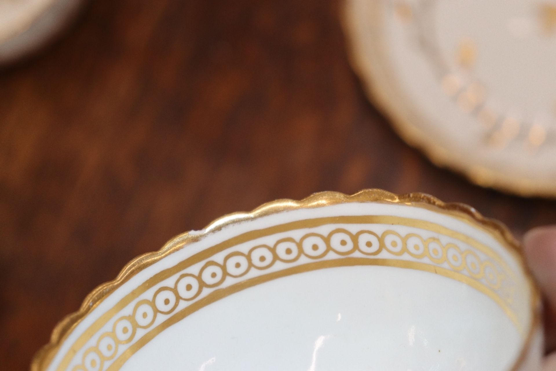 An early 19th Century English porcelain part tea set, of fluted design comprising numerous cups, - Image 21 of 32