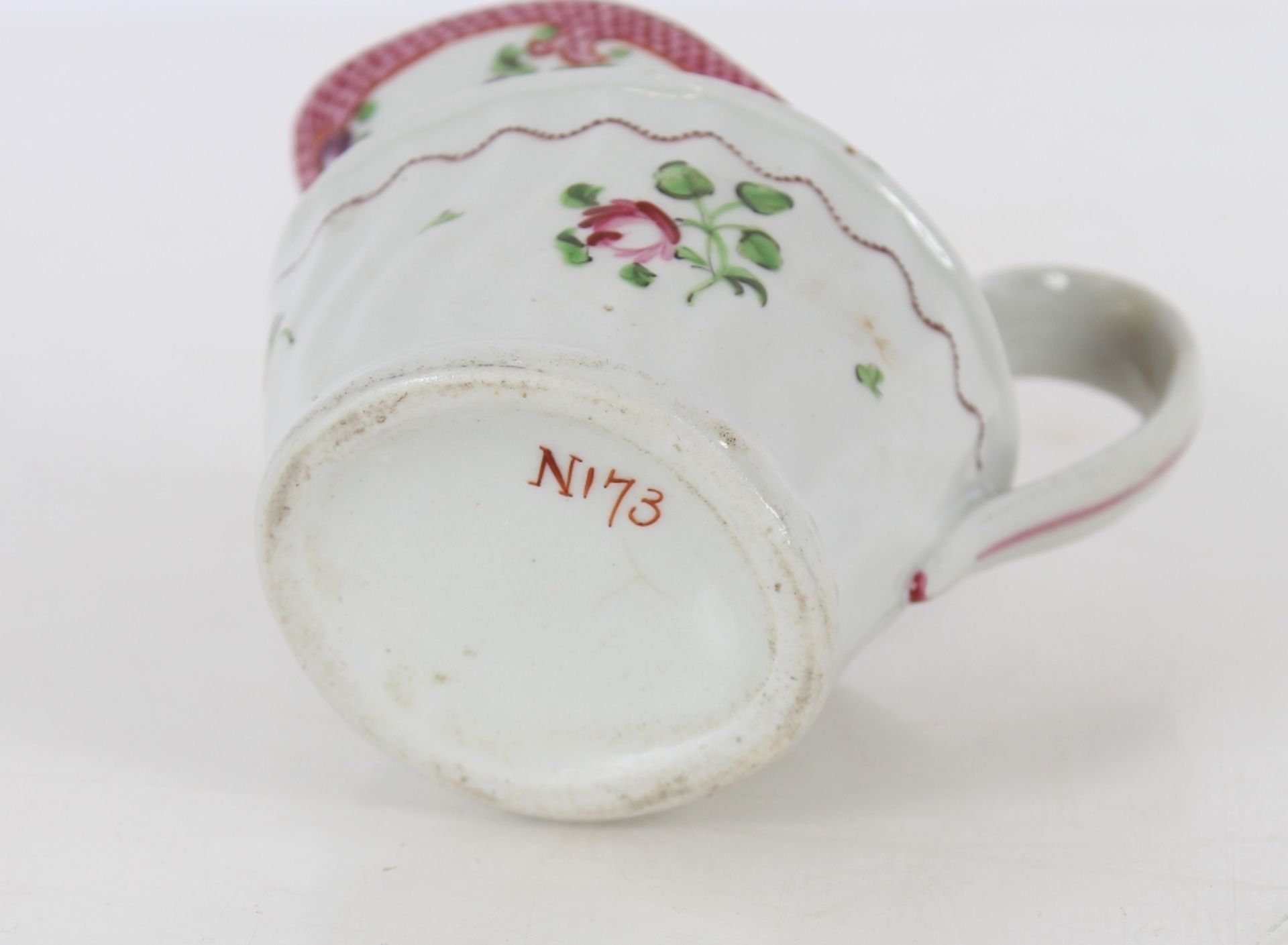 A Newhall porcelain cream jug, of fluted form, floral spray decoration marked N173 to base; and a - Image 3 of 6