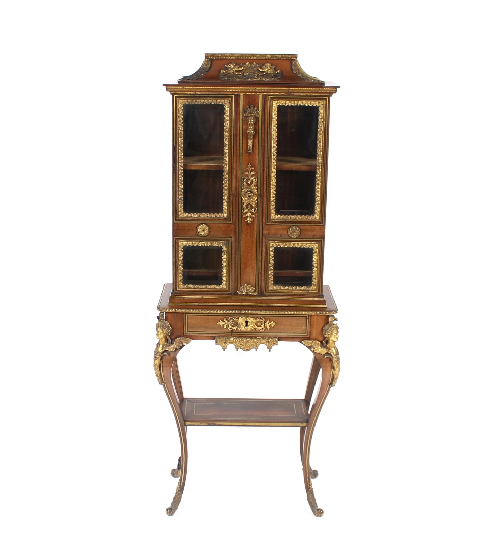 An Edwards & Roberts 19th Century French walnut and ormolu mounted display cabinet of small