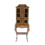 An Edwards & Roberts 19th Century French walnut and ormolu mounted display cabinet of small