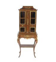 An Edwards & Roberts 19th Century French walnut and ormolu mounted display cabinet of small