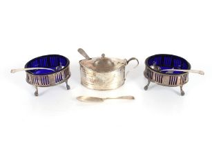 A George III oval silver mustard pot with blue glass liner, London 1794, a pair of oval slats (marks