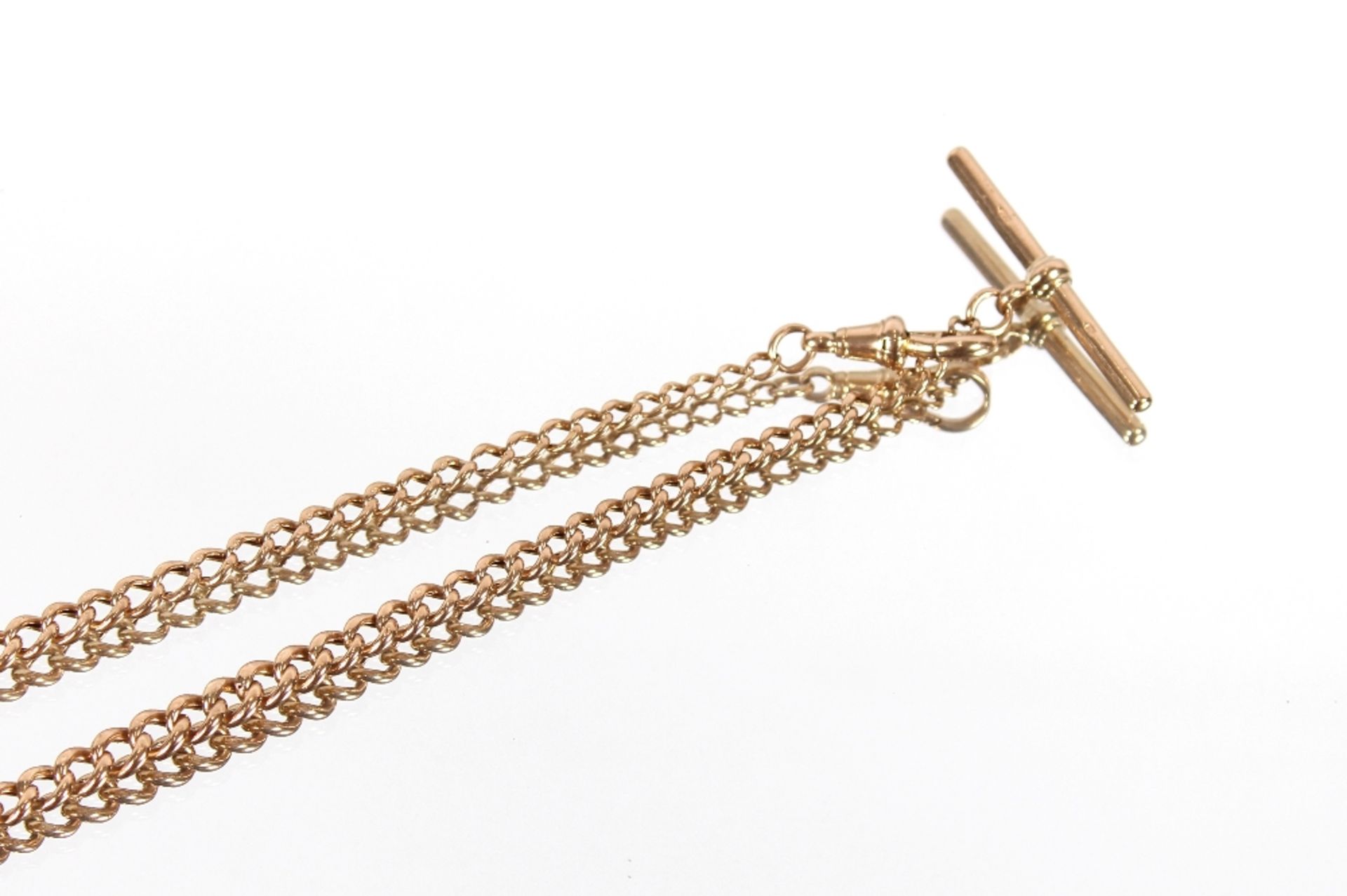 A 9ct gold graduated curb link chain with T bar, 28" (71cms), 39.5gms - Image 2 of 2