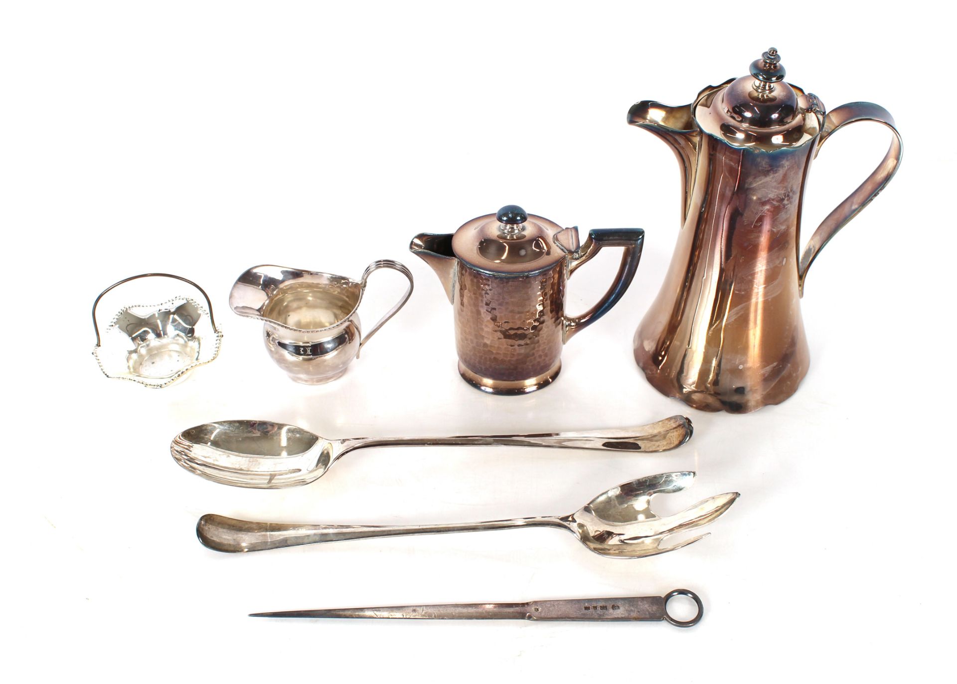 A quantity of various plated ware to include an etched glass claret jug; coffee and hot water